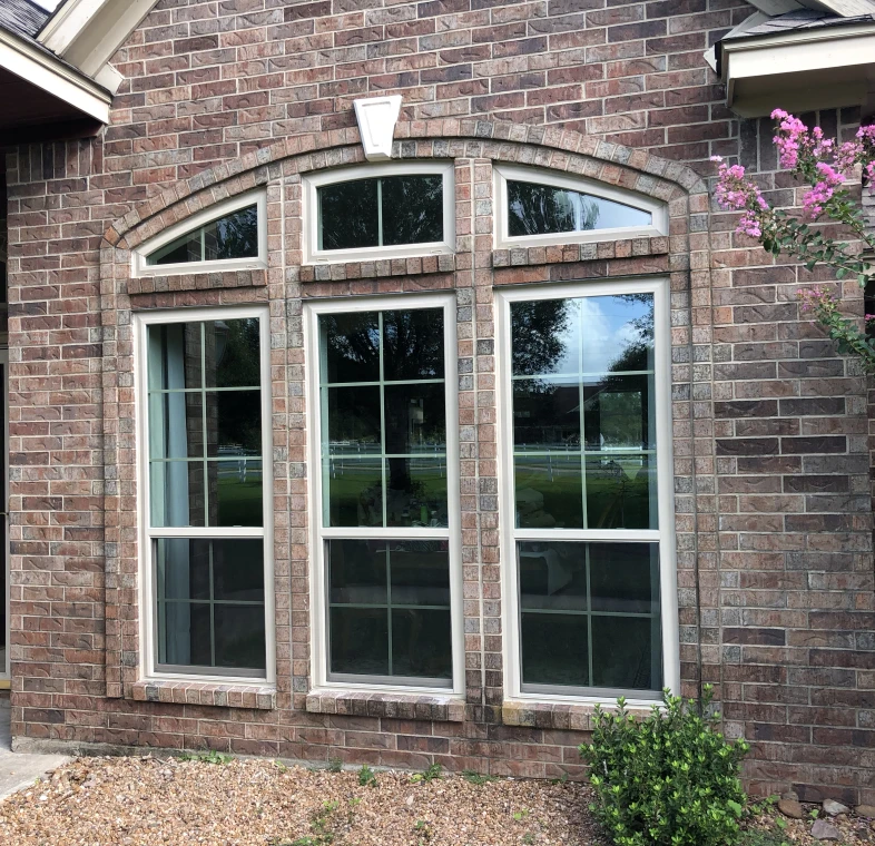 Brick wall with arched windows
